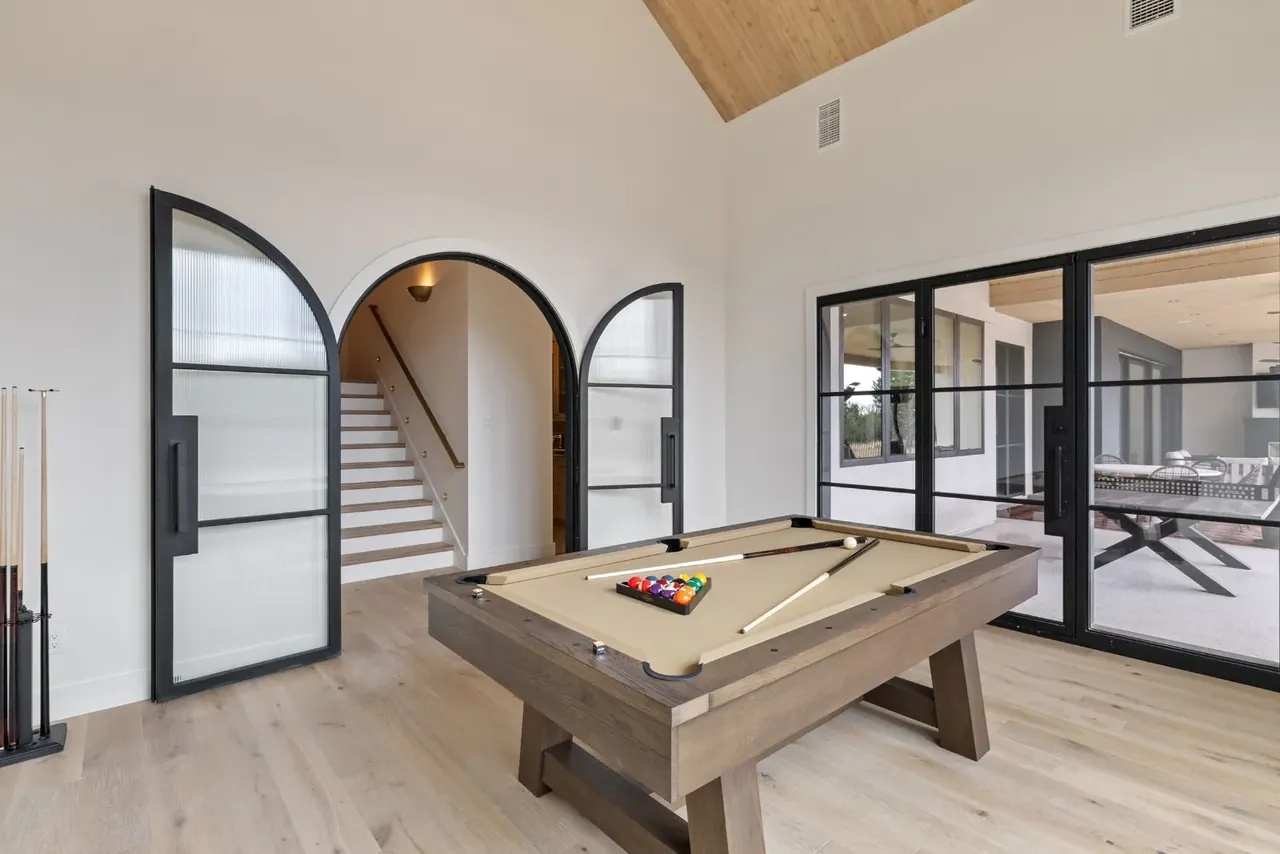 Game room with a pool table