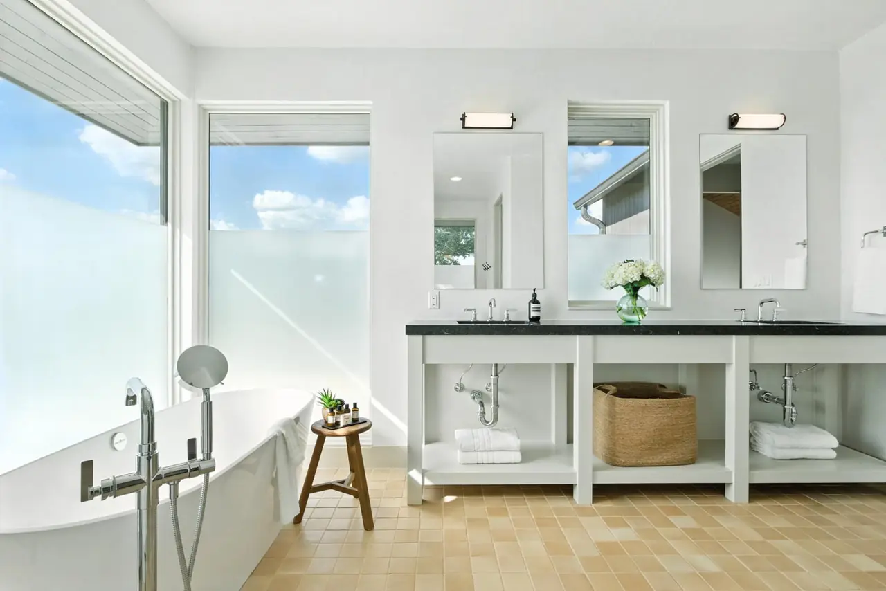 Bathroom with a freestanding tub and double vanity