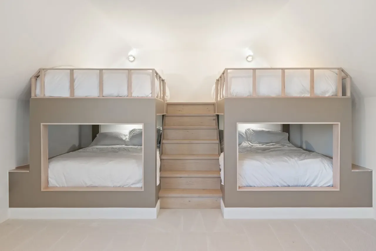 Bunk room with built-in beds