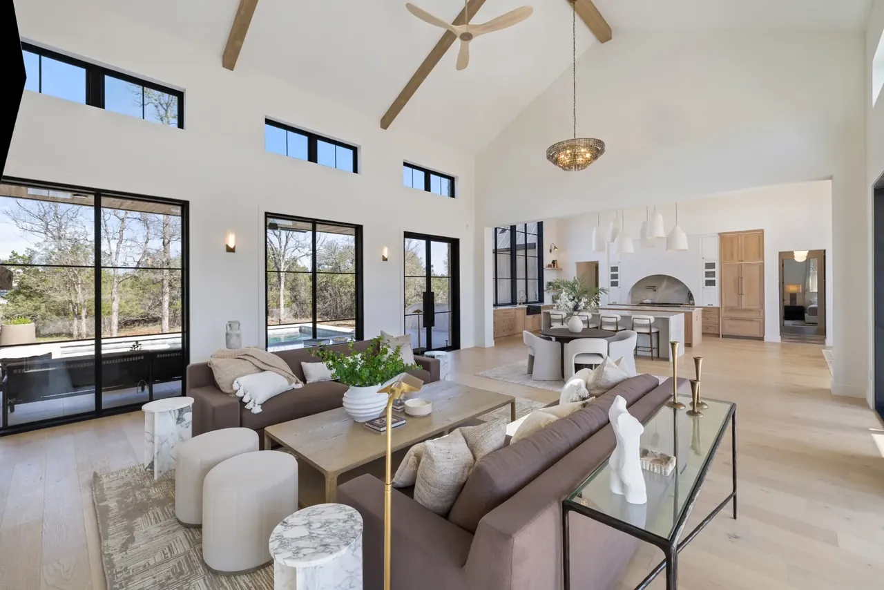 Great room with a vaulted ceiling, open to the kitchen