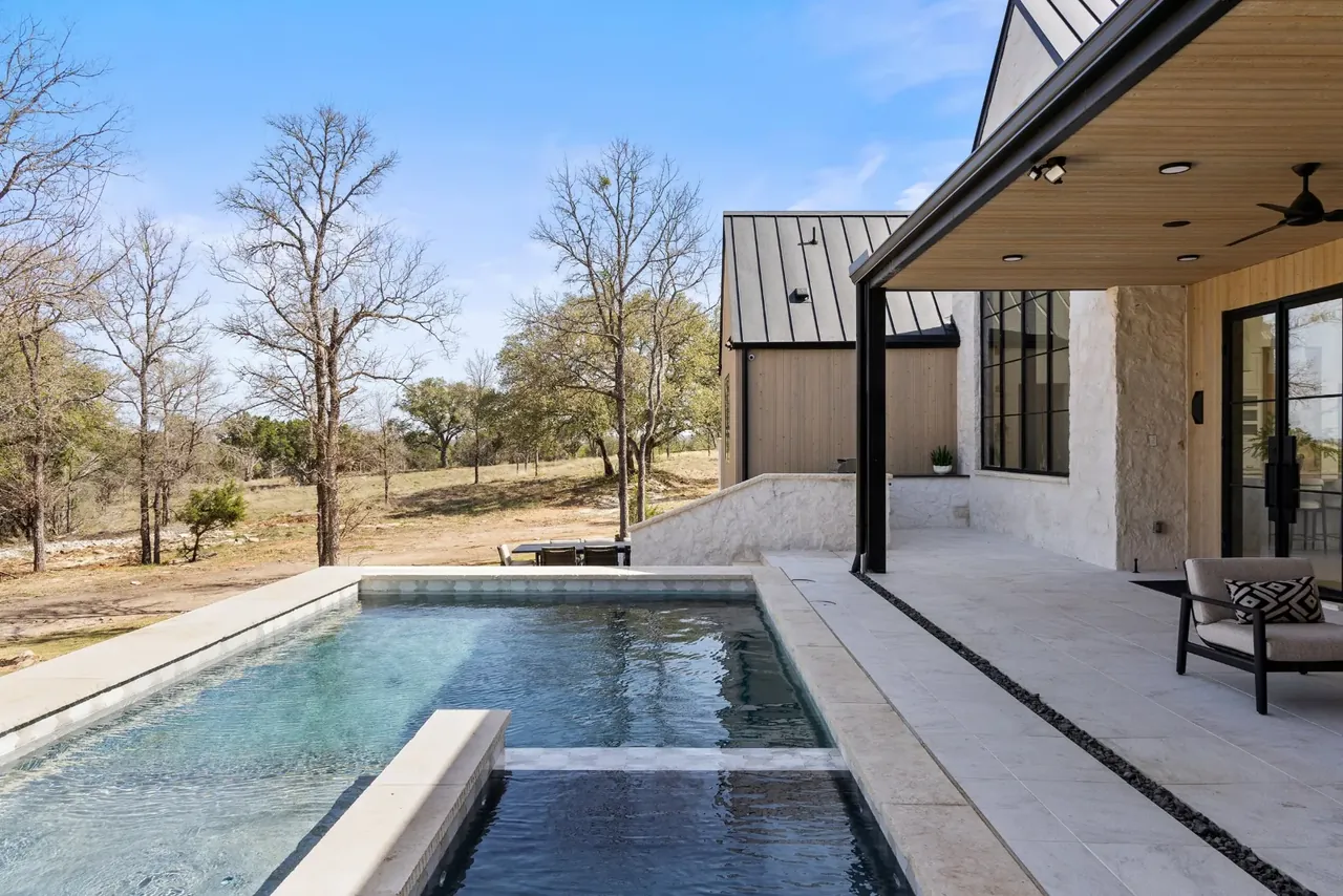 Pool and hot tub looking out to the oaks